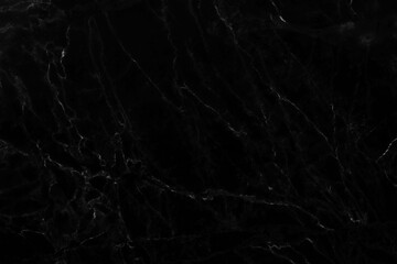 Natural black marble surface, beautiful patterned and scratched with high resolution, used for design work. And interior decoration