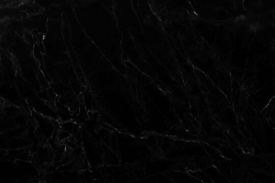 Natural black marble surface, beautiful patterned and scratched with high resolution, used for design work. And interior decoration