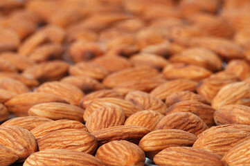 Background from the nuts of almonds, selective focus.