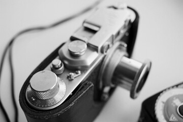 Fototapeta na wymiar Vintage film camera in a leather case