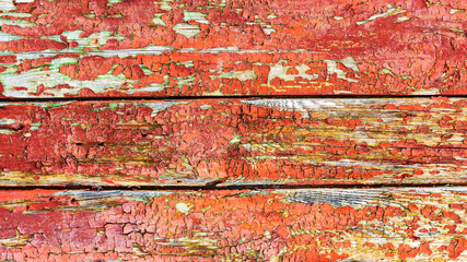 Background gloomy charred wooden fence in dark colors