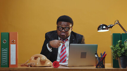 Shocked afro-american recruiter manager reading resume papers looking frustrated serious shouting...
