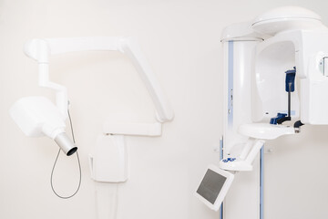 Close up dental 3D x-ray digital scanner panorama machine in clinic. Copy space on display