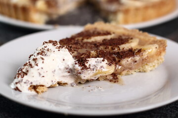 Boston Banoffee Pie. Biscuity Shortcrust Pastry with Caramel Fudge Filling and Banana Topping.