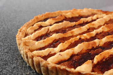 Shoofly Tart with Golden Syrup Filling on Granite Surface