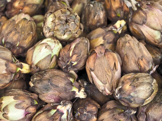 Pile of Delicious artichokes at a food market