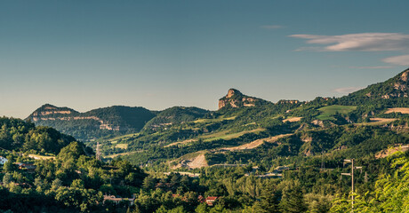 Fototapeta premium The Badolo cliff (Rocca di Badolo) and Mount Mario viewed from Vado on the Setta River Valley, Bologna hillside, Emilia Romagna, Italy.