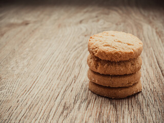 Stacked biscuit sweet cookie on rustic wooden table