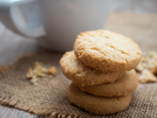 Stacked biscuit sweet cookie on rustic wooden table