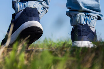 man walking on the grass