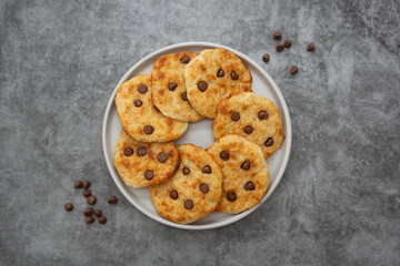 Chocolate chip cookies, top view. Dark background.