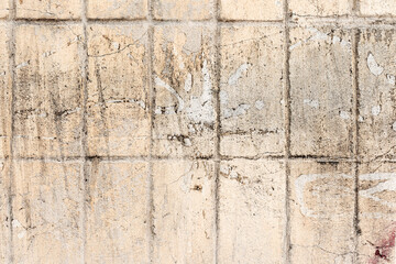 Abstract background old white brick wall with cracks and scratches. Landscape style. Great background or texture.