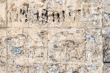 Abstract background old white brick wall with cracks and scratches. Landscape style. Great background or texture.