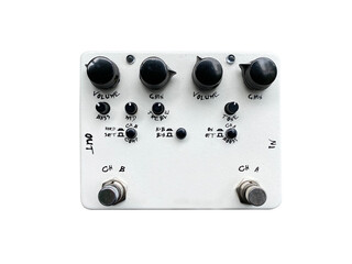 Isolated white overdrive dual-channel stompbox electric guitar effect for studio and stage performed on white background with clipping path. music concept..
