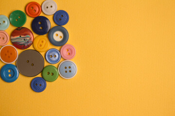 yellow background with multifarious buttons 