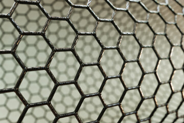 Naklejka premium 3D rendering of carbon nanotube on dark background, black atoms and bonds