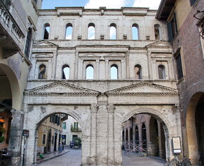 Fototapeta na wymiar The ancient Porta Borsari (Roman gate) 1st century A.D. Verona (UNESCO world heritage site) - Veneto, Italy, Europe