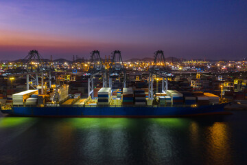 Container , container ship in export and import business and logistics. Shipping cargo to harbor by crane. Water transport International. Aerial view and top view.