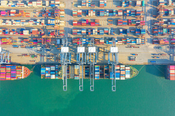 Fototapeta na wymiar Container , container ship in export and import business and logistics. Shipping cargo to harbor by crane. Water transport International. Aerial view and top view.