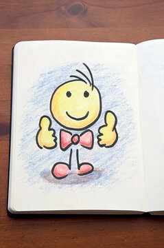 Manikin_smiling_thumbs up_colored pencil_drawn_paper notebook