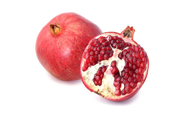 Ripe pomegranate and half isolated on white