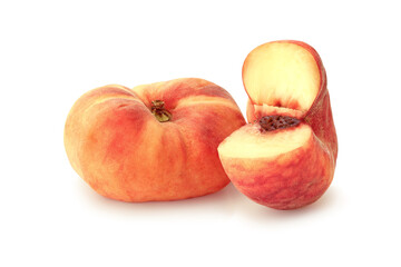 Fototapeta na wymiar Whole and cut flat peaches isolated on white