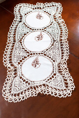 Vintage background with white crochet lace. Knitted frame for wedding and invitation. Background for valentines day or birthday