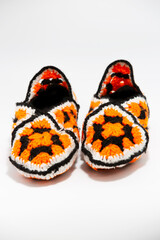 traditional Booties are knitted with different colored