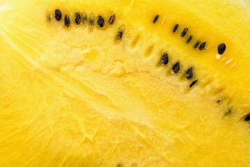 Closeup of fresh yellow watermelon slices on plate