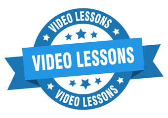 video lessons round ribbon isolated label. video lessons sign