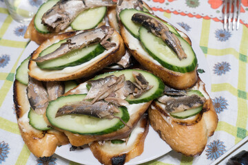 sandwiches with fish and cucumbers