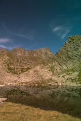 Fototapeta na wymiar Mountain lake in the summer time hiking 