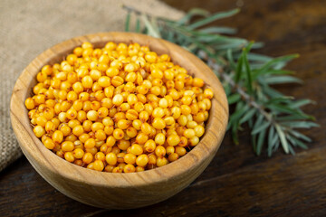 Berries of sea-buckthorn  in bowl .