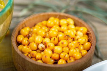 Berries of sea-buckthorn  in bowl .