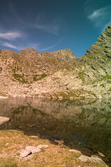 Fototapeta na wymiar Mountain lake in the summer time hiking 