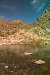 Fototapeta na wymiar Mountain lake in the summer time hiking 