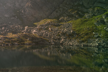 Mountain lake in the summer time hiking 