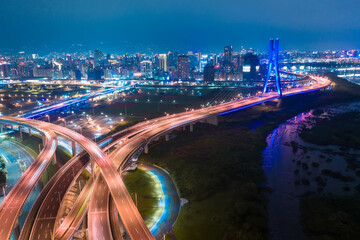 Taiwan, New Taipei City, the beautiful twists and turns of the river, reflecting the sky, bridges, city beautiful scenery.