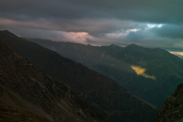 Sunbeam in the mountains in summer time