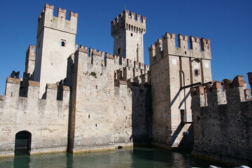 Obraz premium Scaligero Castle (Rocca Scaligera) medieval fortress on the island of Sirmione, Garda Lake