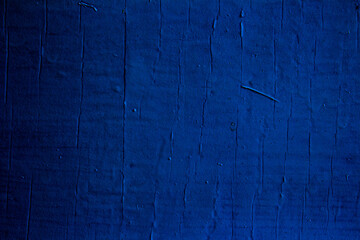 Blue colored abstract wall background with textures of different shades of blue