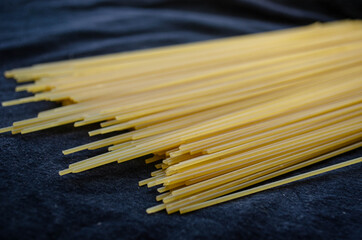spaghetti on black background