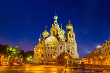 Fototapeta na wymiar Saint Petersburg. Russia. Church of the Savior on blood against the evening sky. Cathedral of the Resurrection of Christ on Blood. Churches Of St. Petersburg. Church with colorful domes in Petersburg.