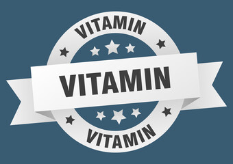 vitamin round ribbon isolated label. vitamin sign
