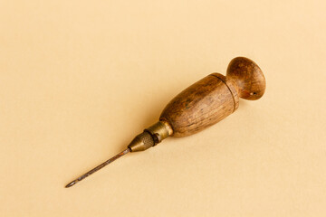 old tool for working wool /old wooden and metal tool for working wool