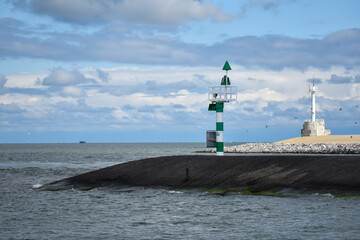 Fototapeta premium Harbour head with beacons at the entrance to the port of Den Helder, the Netherlands
