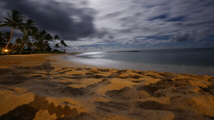 Sandy beach in Kauai under the moonlight
