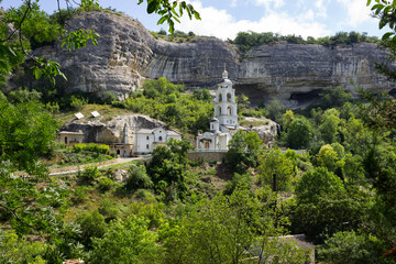 Fototapeta na wymiar beautiful summer view of the majestic temple in the mountains, located in the Crimea