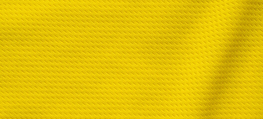Yellow sports clothing fabric football shirt jersey texture close up