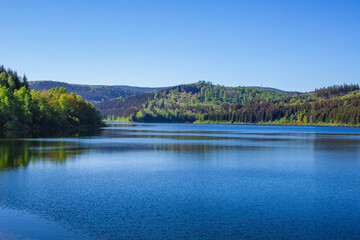 Fototapeta na wymiar Tranquil view of Granestausee, a reservoir in Harz Mountains National Park, Germany